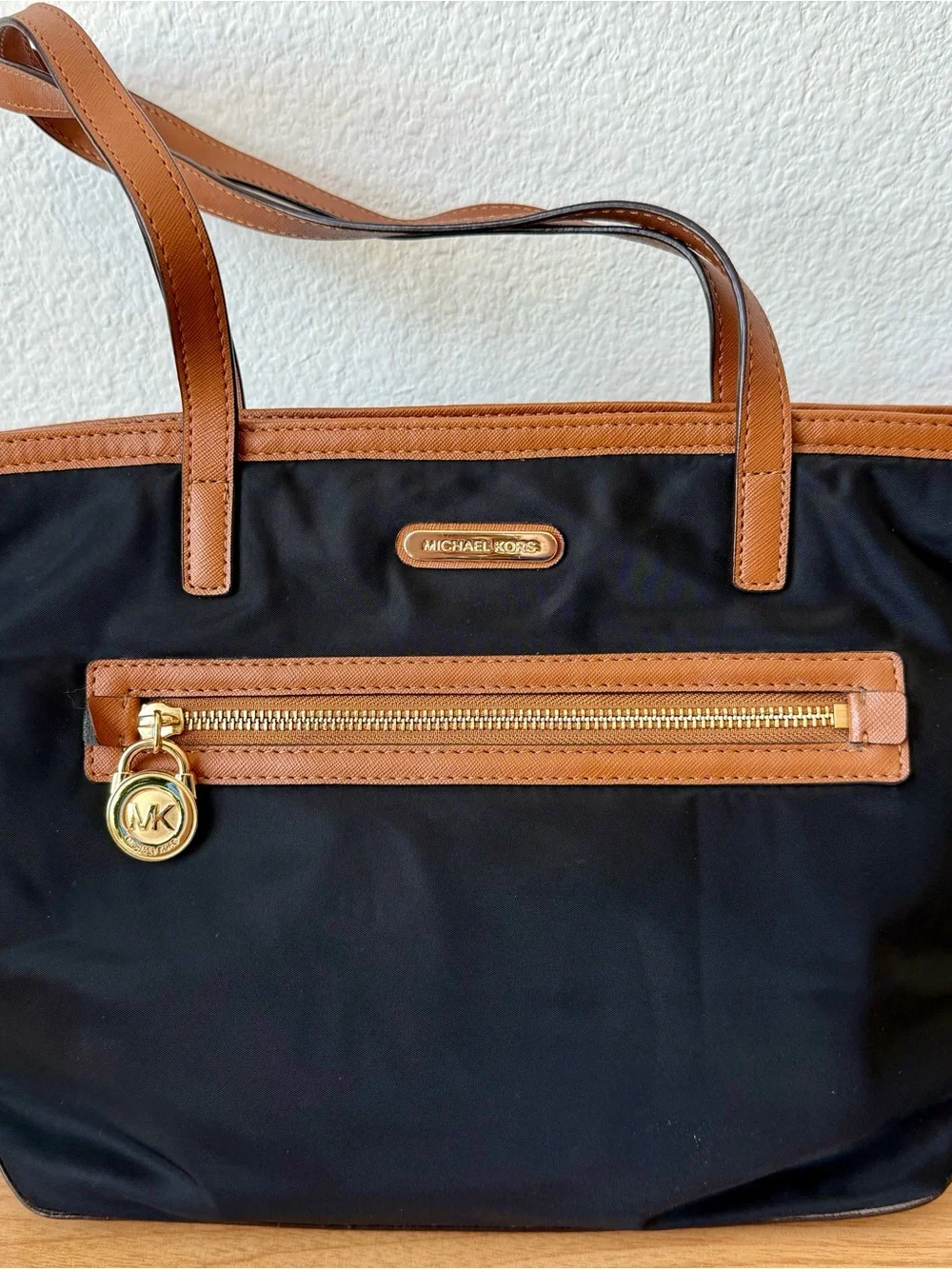 Michael Kors Black Tote with Brown Trim and Gold Hardware